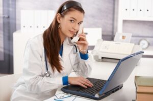 Portrait of young female doctor at office